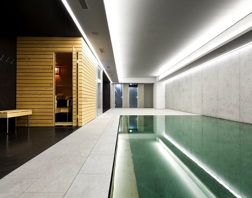 Badhuis met een zwembad: een project van een geweldig saunacomplex voor ontspanning