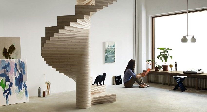 Spiraalvormige trap naar de tweede verdieping in een privéhuis: foto's, prijzen voor ontwerpen